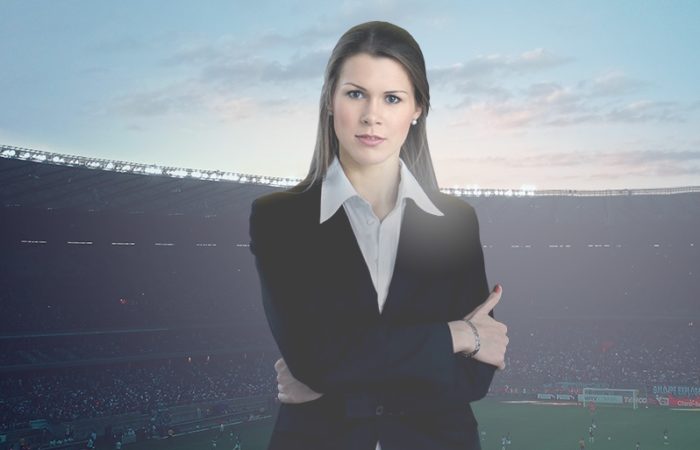 Woman in a football stadium