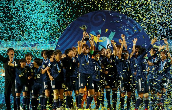 Japan football players celebrating