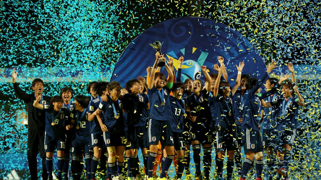 Japan football players celebrating